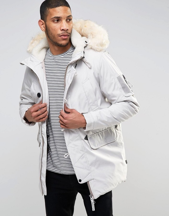 Мужик в белой куртке. Bellfield Parka 2021. Мужская белая парка с мехом dsquared2. Men's Parka with a Faux fur-Hood Jacket. Мужская куртка thisisneverthat Batik Faux fur Beige.