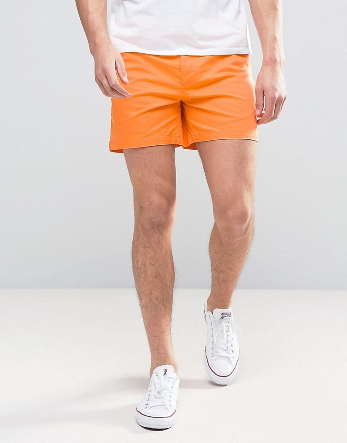orange chino shorts. 