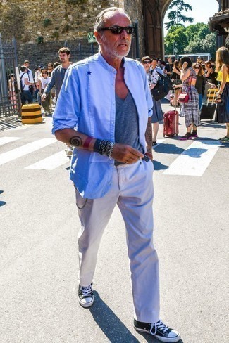 С чем носить черный кожаный ремень с украшением мужчине