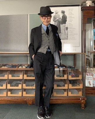 Какие жилеты носить с черным костюмом