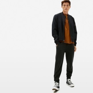 С чем носить черные спортивные штаны мужчине