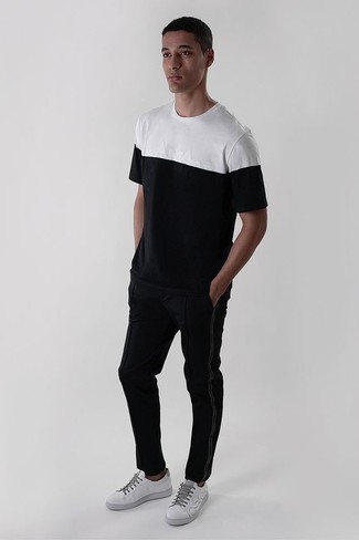 Какие низкие кеды носить с черными спортивными штанами мужчине