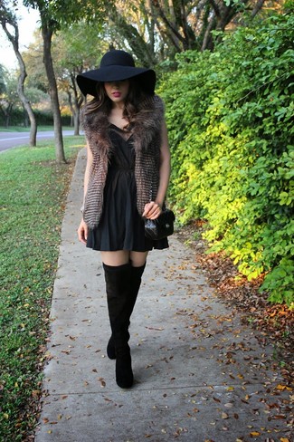 С чем носить коричневую меховую безрукавку женщине