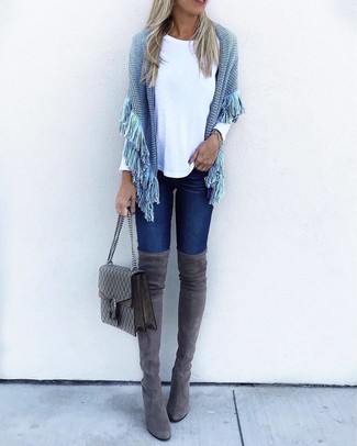 С чем носить вязаное пончо