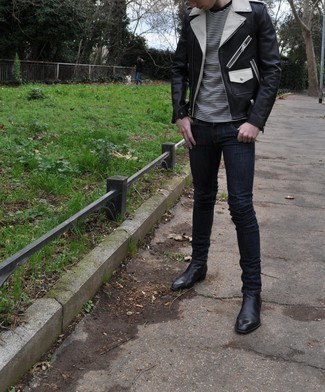 Какие косухи носить с темно-синими зауженными джинсами мужчине