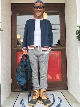 Какие бомберы носить с светло-коричневым зимними ботинками мужчине