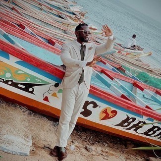 С чем носить темно-бирюзовый галстук мужчине