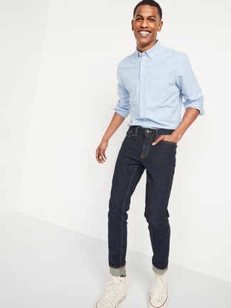 Какие джинсы носить с бело-коричневыми высокими кедами в 20 лет мужчине: Любителям стиля кэжуал придется по душе дуэт голубой рубашки с длинным рукавом и джинсов. Создать интересный контраст с остальными предметами из этого образа помогут бело-коричневые высокие кеды.