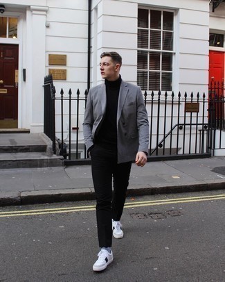 Мужские бело-черные кожаные низкие кеды от Alexander McQueen