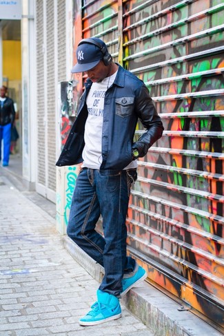 Как носить джинсовую куртку с высокими кедами мужчине: Джинсовая куртка и темно-синие джинсы стильно вписываются в гардероб самых взыскательных джентльменов. Такой ансамбль несложно адаптировать к повседневным условиям городской жизни, если надеть в тандеме с ним высокие кеды.