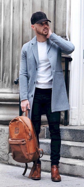 С чем носить свитшот в 30 лет мужчине в прохладную погоду: Если ты делаешь ставку на комфорт и практичность, свитшот и черные зауженные джинсы — замечательный выбор для стильного мужского лука на каждый день. Теперь почему бы не привнести в повседневный лук чуточку изысканности с помощью коричневых кожаных ботинок челси?