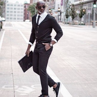 Мужской черный кожаный мужской клатч от Calvin Klein Jeans