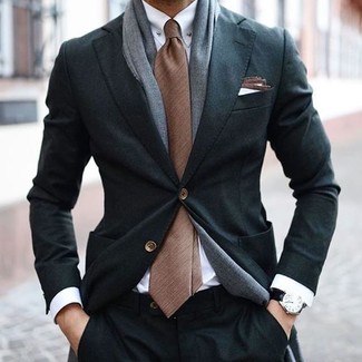 С чем носить коричневый галстук мужчине весна в деловом стиле: Несмотря на то, что это классический образ, ансамбль из черного костюма и коричневого галстука всегда будет по душе стильным молодым людям, пленяя при этом сердца прекрасных дам. Когда наступает теплая весенняя пора, мы снимаем тяжелые шубы и толстые куртки и встает вопрос о том, что носить, чтобы выглядеть по-весеннему притягательно и модно. Подобное сочетание станет хорошим источником стильного вдохновения.