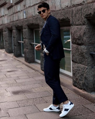 Мужские бело-темно-синие кожаные низкие кеды от Alexander McQueen