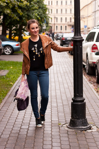 Женский черный свитер с круглым вырезом с украшением от Saint Laurent