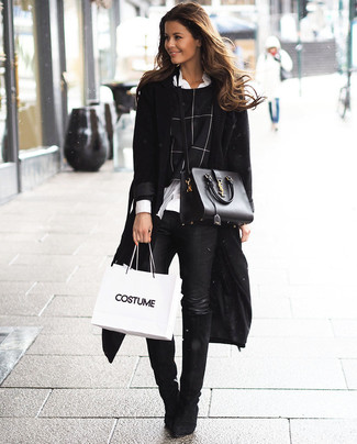 Женское черное пальто от Maison Margiela