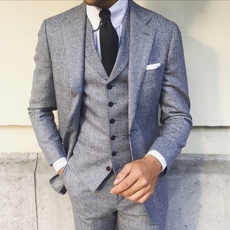 С чем носить черный галстук в 20 лет мужчине в теплую погоду: Серый костюм-тройка в паре с черным галстуком позволит примерить на себя строгий деловой стиль.