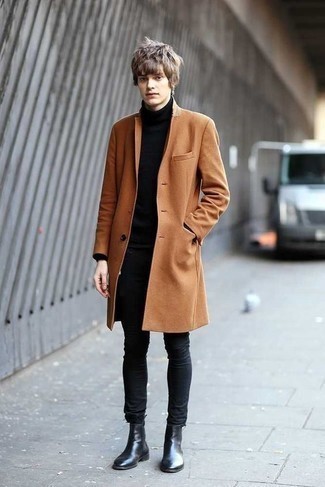 Какие ботинки челси носить с коричневым длинным пальто в 20 лет в холод: Если ты любишь одеваться с иголочки, и при этом чувствовать себя комфортно и нескованно, стоит попробовать это сочетание коричневого длинного пальто и темно-серых зауженных джинсов. Почему бы не привнести в этот лук на каждый день толику нарядности с помощью ботинок челси?