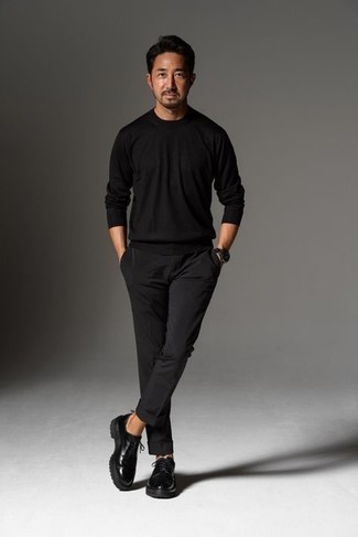 Мужской черный свитер с круглым вырезом от Raf Simons