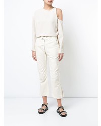 Бежевая блузка с длинным рукавом от Nomia