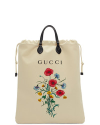 Мужская бежевая большая сумка из плотной ткани с принтом от Gucci