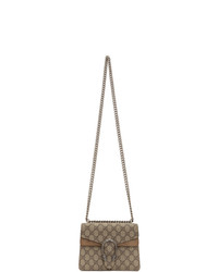 Бежевая сумка-саквояж из плотной ткани с принтом от Gucci