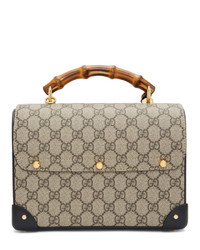 Бежевая сумка через плечо из плотной ткани с принтом от Gucci