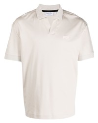 Мужская бежевая футболка-поло от Calvin Klein