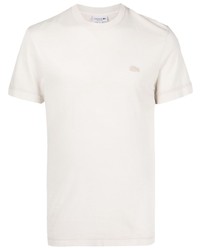 Мужская бежевая футболка с круглым вырезом с вышивкой от Lacoste