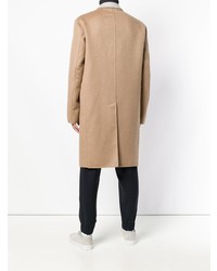 Бежевое длинное пальто от Maison Flaneur