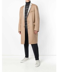Бежевое длинное пальто от Maison Flaneur