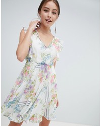 Бежевое коктейльное платье с цветочным принтом от ASOS DESIGN