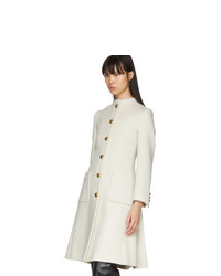 Женское бежевое пальто от Gucci