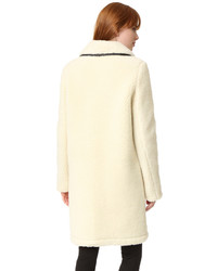 Женское бежевое пушистое пальто от Carven