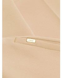 Бежевые брюки-клеш от Chloé