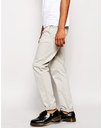 Бежевые брюки чинос от Love Moschino