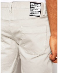 Бежевые брюки чинос от Love Moschino