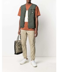 Бежевые брюки чинос от Stone Island