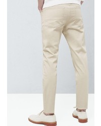 Бежевые брюки чинос от Mango Man