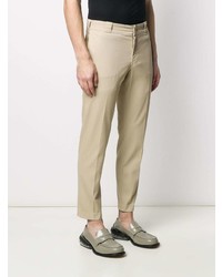 Бежевые брюки чинос от Prada