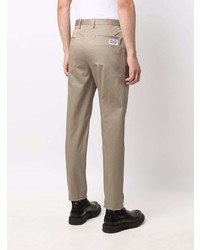 Бежевые брюки чинос от Dolce & Gabbana