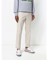 Бежевые брюки чинос от Tommy Jeans