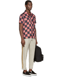 Мужские бежевые брюки от Palm Angels