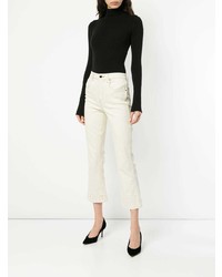 Бежевые джинсы-клеш от Khaite