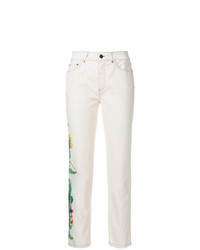 Бежевые джинсы с цветочным принтом