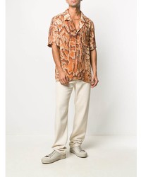 Мужские бежевые джинсы от Nanushka