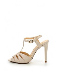 Бежевые кожаные босоножки на каблуке от Inario