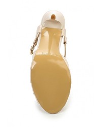 Бежевые кожаные босоножки на каблуке от Inario