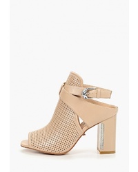 Бежевые кожаные босоножки на каблуке от Lino Marano