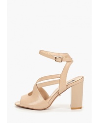 Бежевые кожаные босоножки на каблуке от Lino Marano